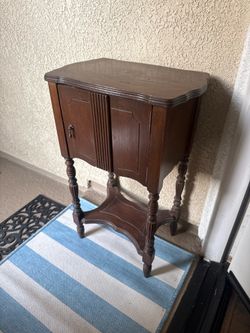 Antique side table with cabinet