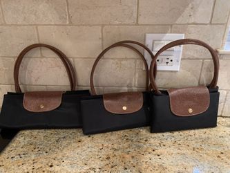 Three foldable purses