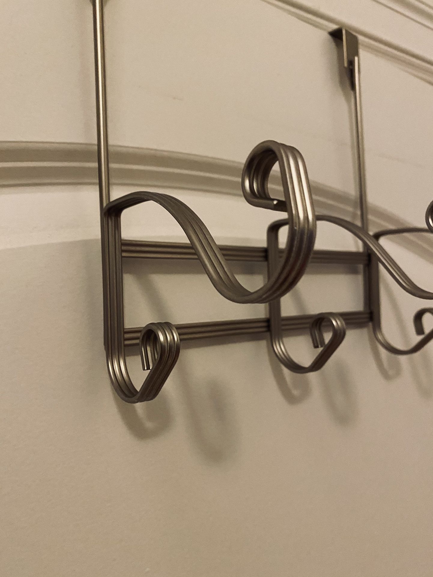 Over-Door hanging 3 Double-Hooks Assembly. Nice design. New. Never used. Great bargain. 8.5” wide.