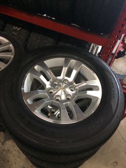 18 inch stock chevy rims and tires great condition