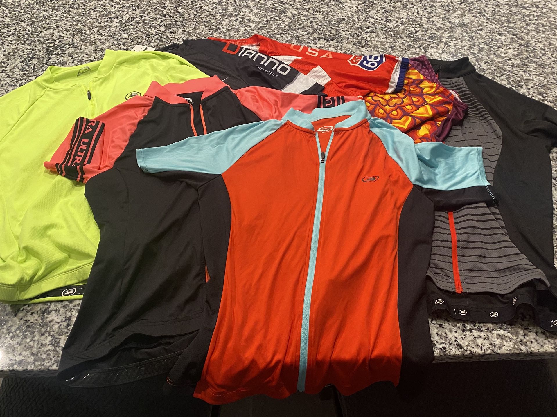 Lot of 7 Women’s Cycling Shirts 