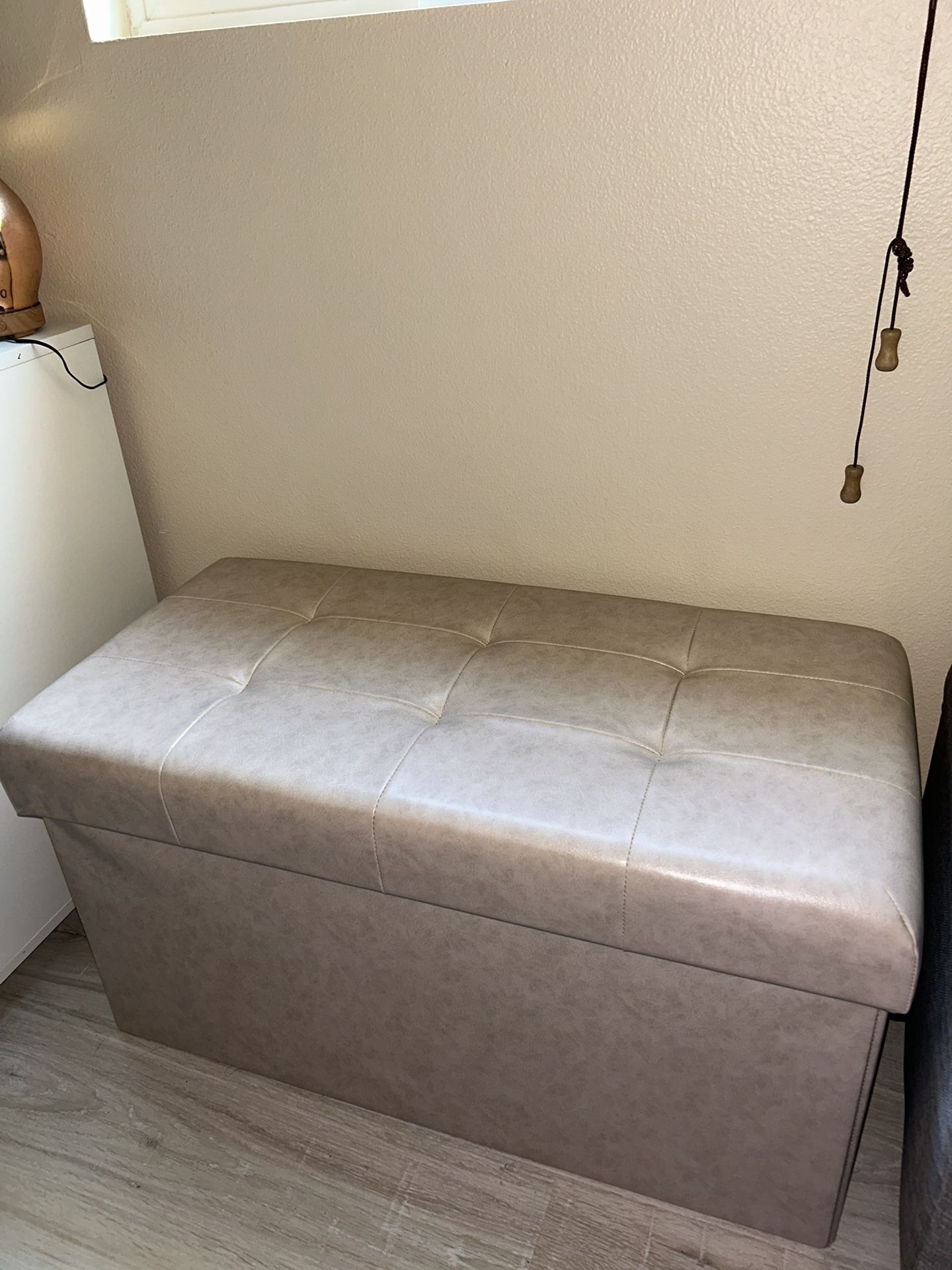 beige ottoman with storage