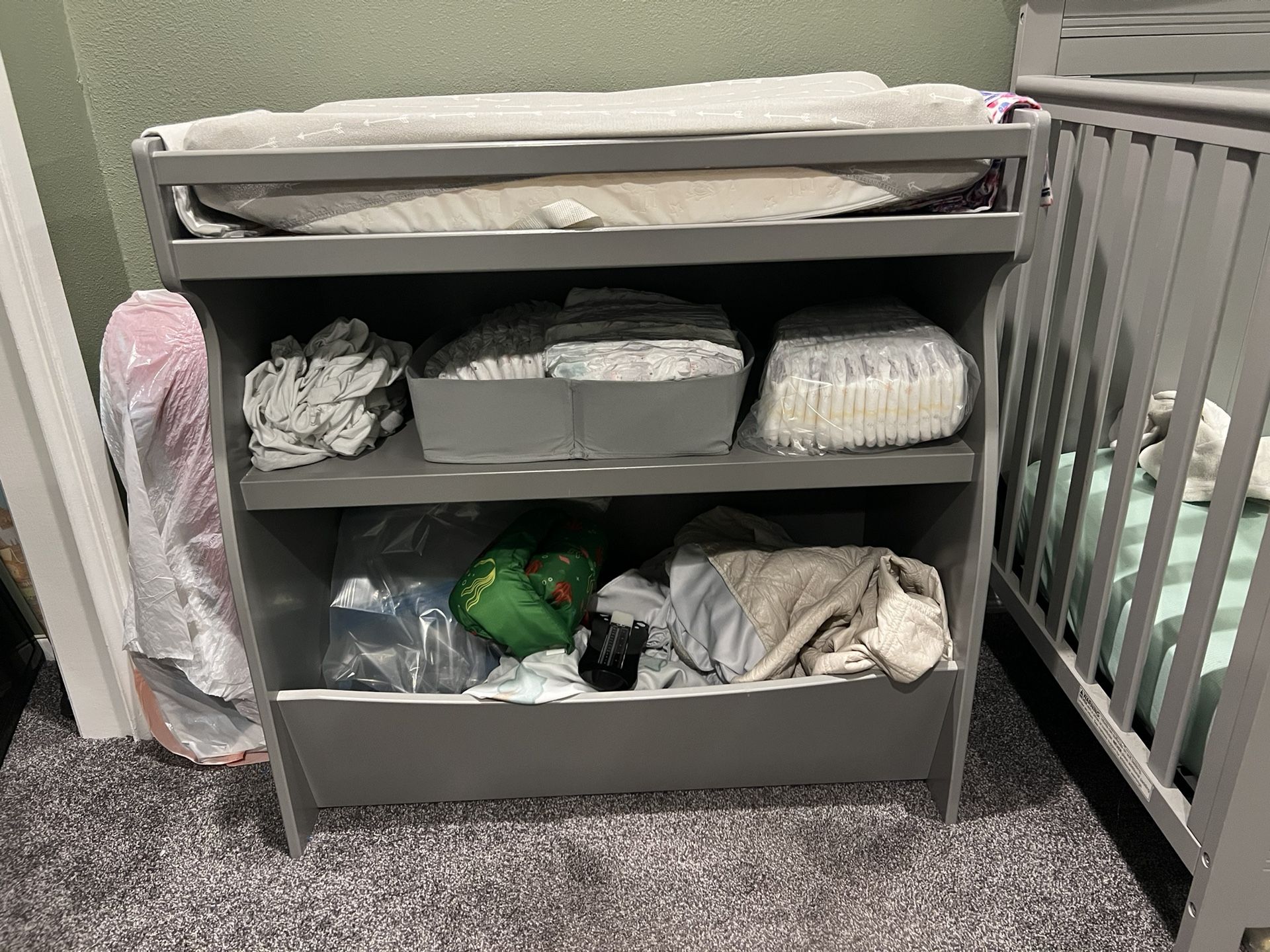 Delta children changing and storage table with brand new changing pad