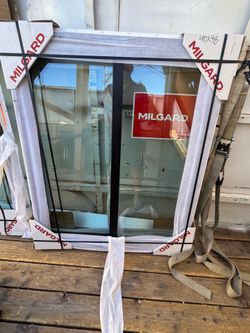 Black sliding glass window 40”wx45”h