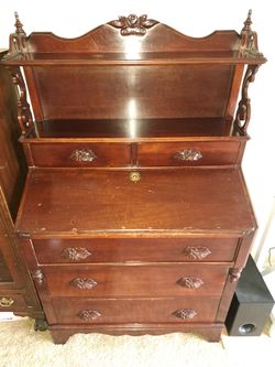 For sale a beautiful, vintage solid wood slant-front secretary desk