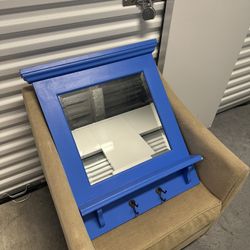 Blue painted mirror