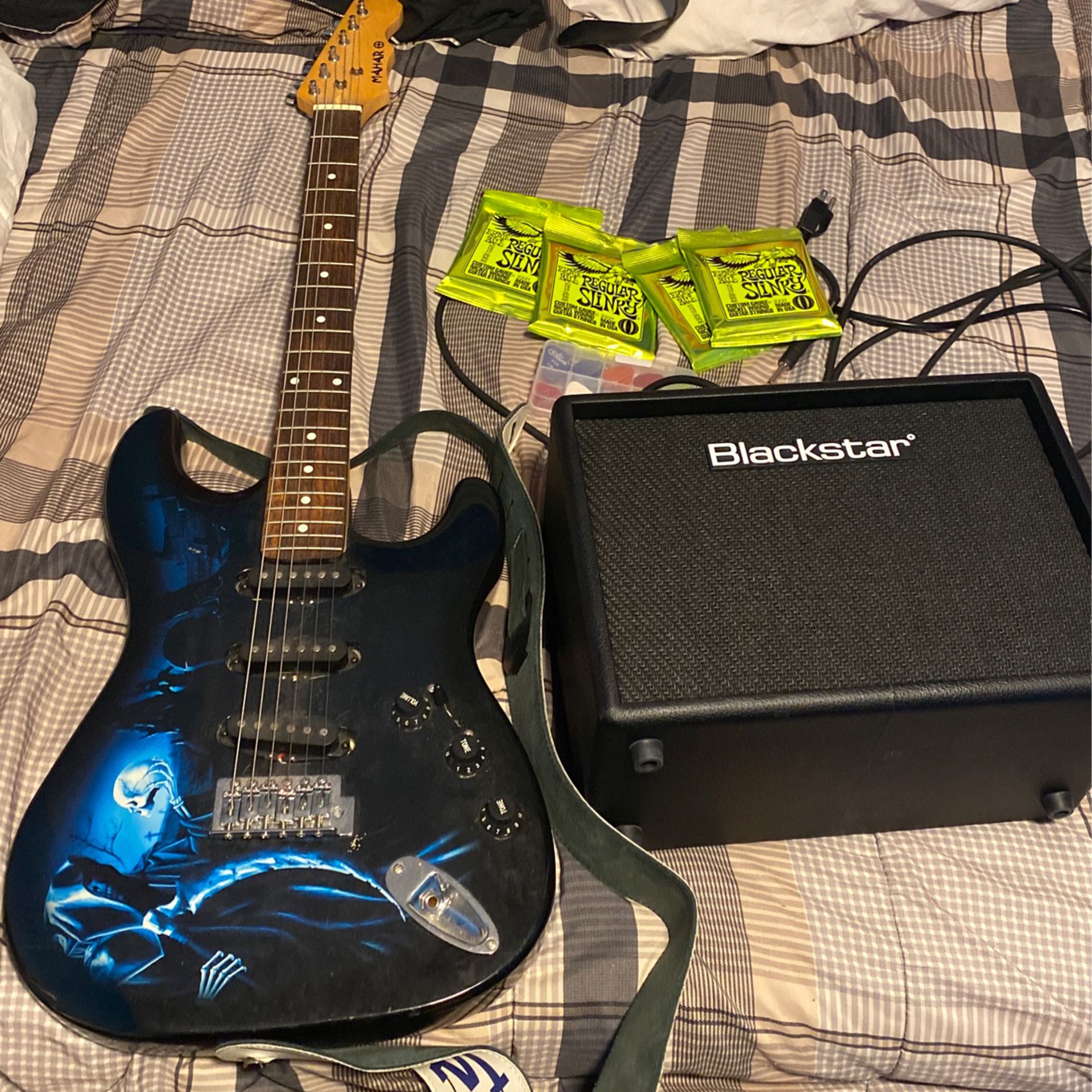 Electric Guitar With An Amplifier