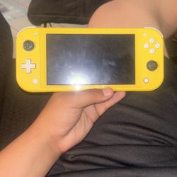 Yellow Nintendo Switch Lite Almost Brand New 