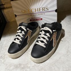 Sketchers slide on shoes. Read description for details and location.