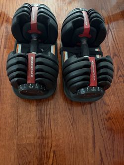 BOWFLEX ADJUSTABLE DUMBELLS