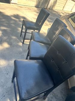 4 Counter height chairs. $50 all.