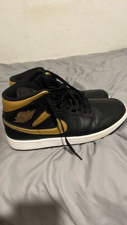 Jordan 1 retros black and gold