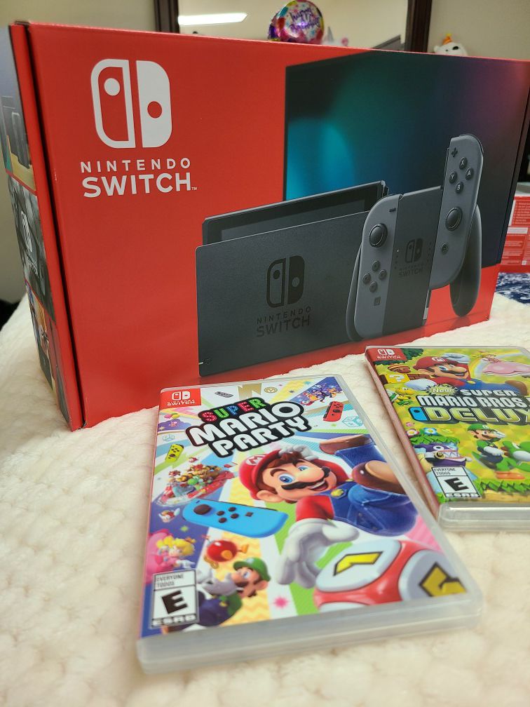 New Nintendo Switch + 2 Games