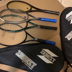 4 tennis rackets in good condition with cases 