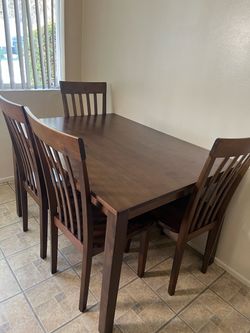 Dining table and 4 chairs