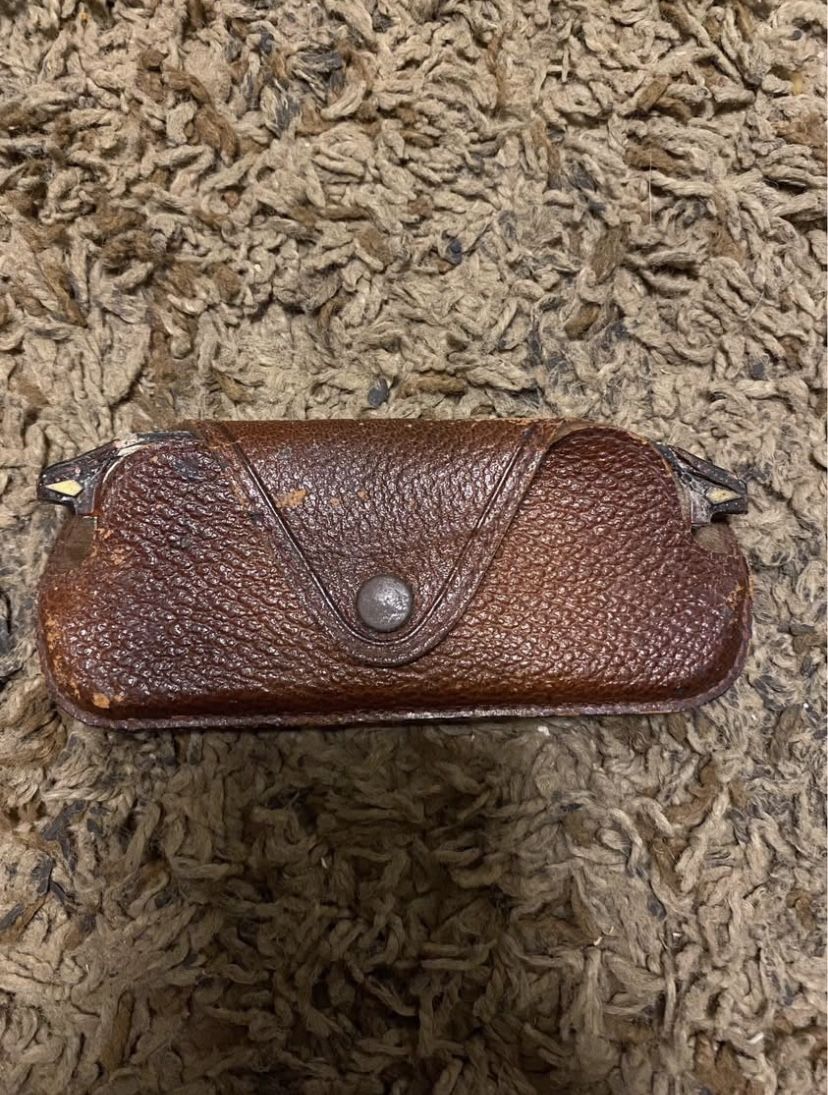 Old antique glasses case and glasses
