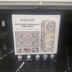 Wyatt and ash area rug