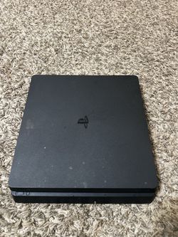 Sony PlayStation 4 Slim Console (No controllers included)