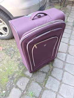 New 30x20 large Travelers  light weight 4  wheel suitcases