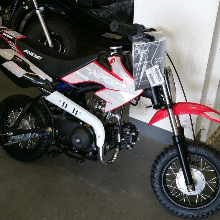 Brand new 70cc dirt bike comes with training wheels