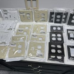 New 25 Plastic Electrical Wall Plates. $10 Takes All. Must Pick Up