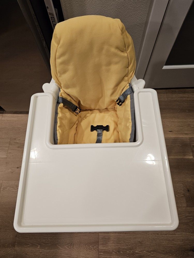 Collapsible baby high chair.