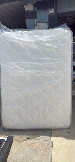 Full size White Quilted Mattress Still in Plastic