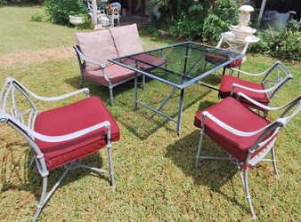 38x66 Metal Patio Table with 4 chairs and bench.