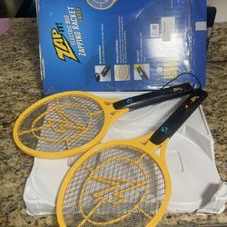 (2) pack electric bug zapping racket in box