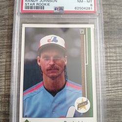 1989 Upper Deck Randy Johnson Star Rookie baseball card, specifically card #25, graded NM-MT 8 by PSA 