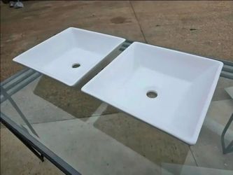 2 new white vessel sinks