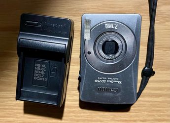 Canon PowerShot ELPH SD750 Digital Camera Silver W/Battery Tested Work