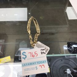 14K Cuban bracelet with nameplate: 1995 N Nellis Blvd 