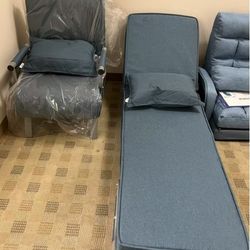 Blue foldable sofa bed with one pillow