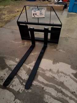 Skid steer spikes universal
