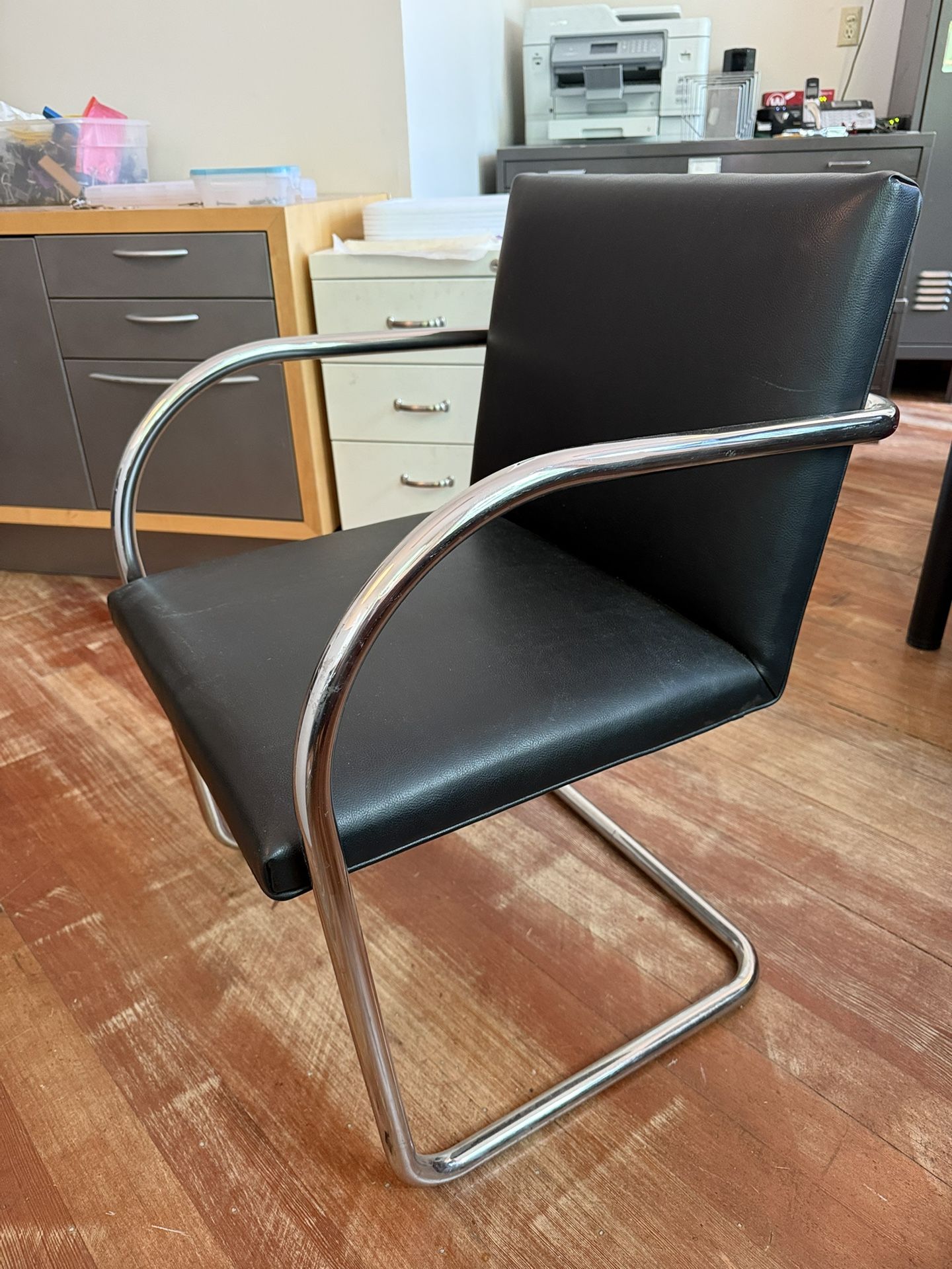 Leather And Stainless Steel Chairs