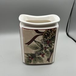 222 Fifth Yuletide Celebration ceramic canister with a festive floral and fruit design