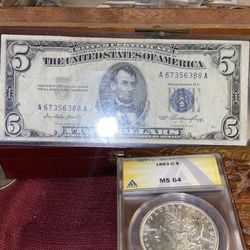 1883–0 MS 64ANACS silver Morgan Dollar with a rear 1953 five dollar  silver
