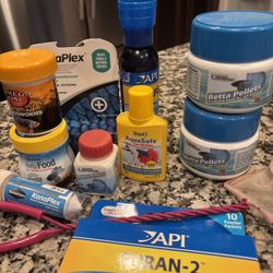 Various Fish Food And Supplies 