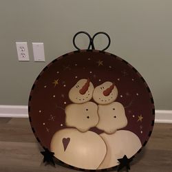 Large primitive snowman bowl with metal stand 