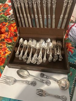 12 pieces.  Silver plated silverware