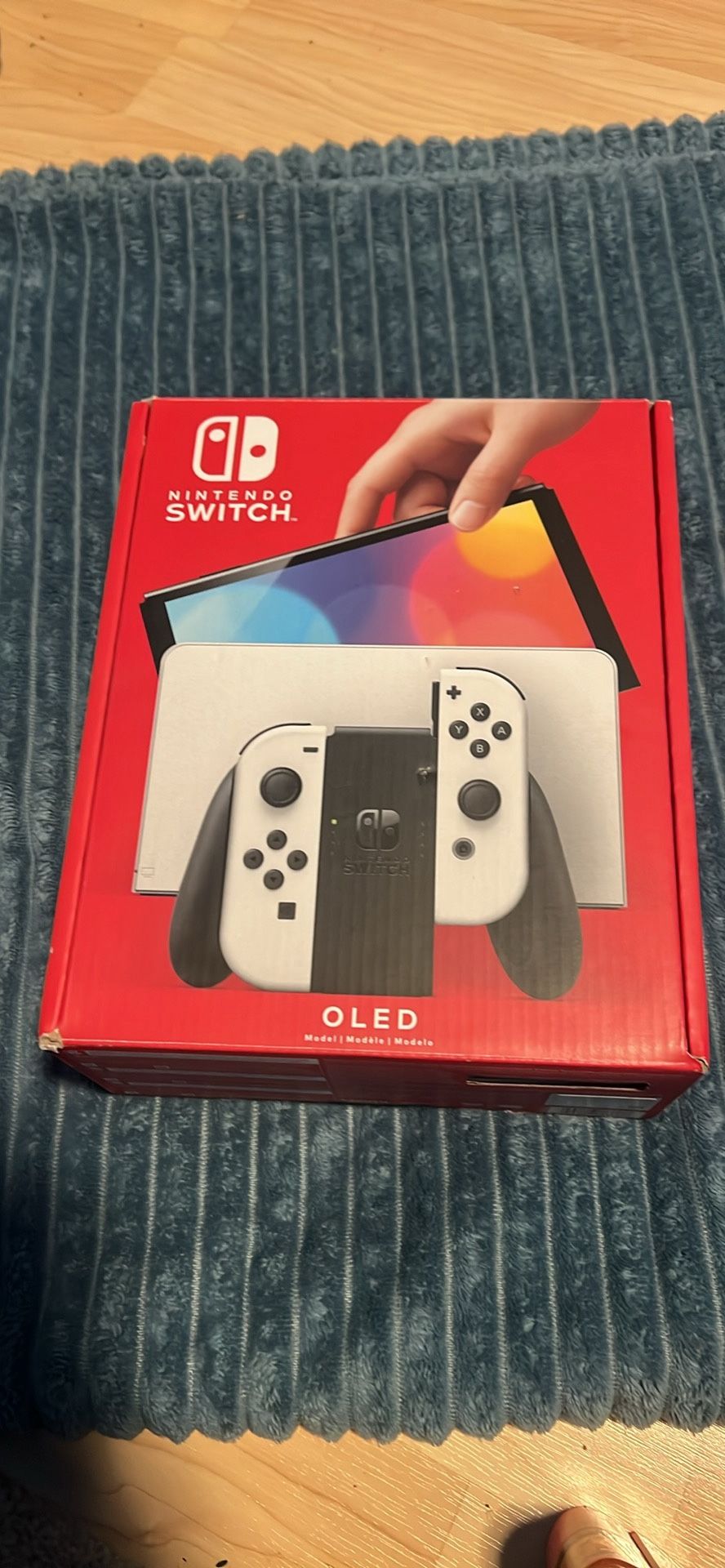 NINTENDO SWITCH OLED IN BOX.