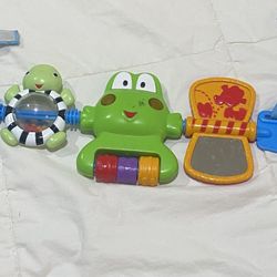 Bright starts hop along frog carrier toy bar car seat attachment 