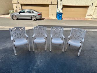 4 Plastic Outdoor Armchairs