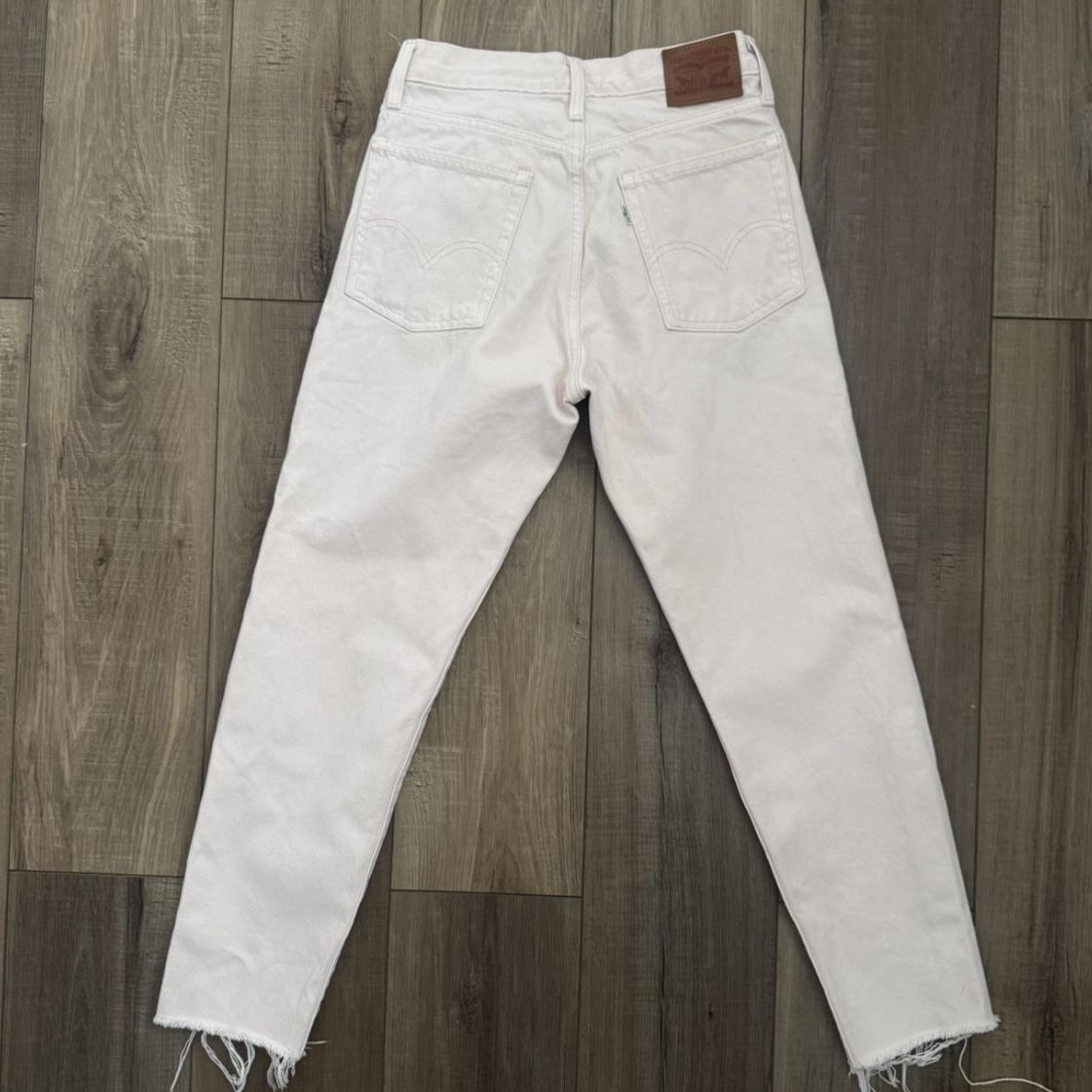 Levis 501 light pink raw hem jeans