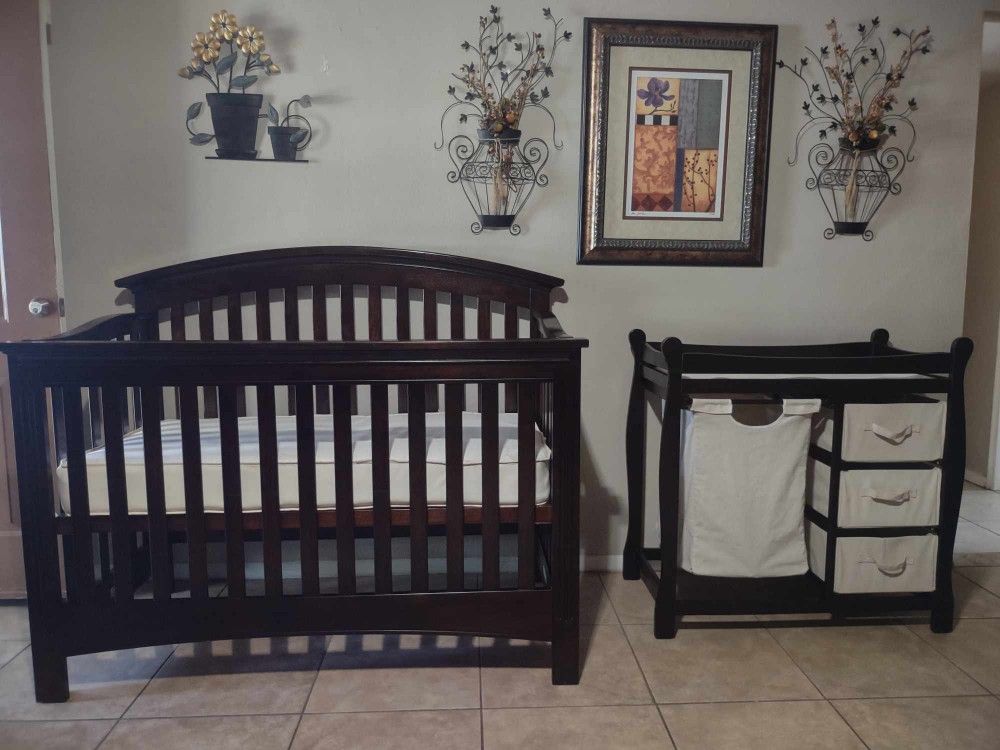 crib, bed and baby changing table.
