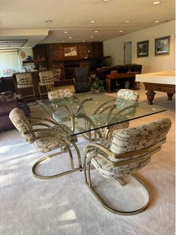 Glass dining table with 4 chairs