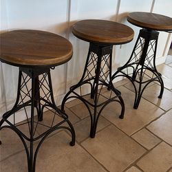 Three barstools (wood and metal)