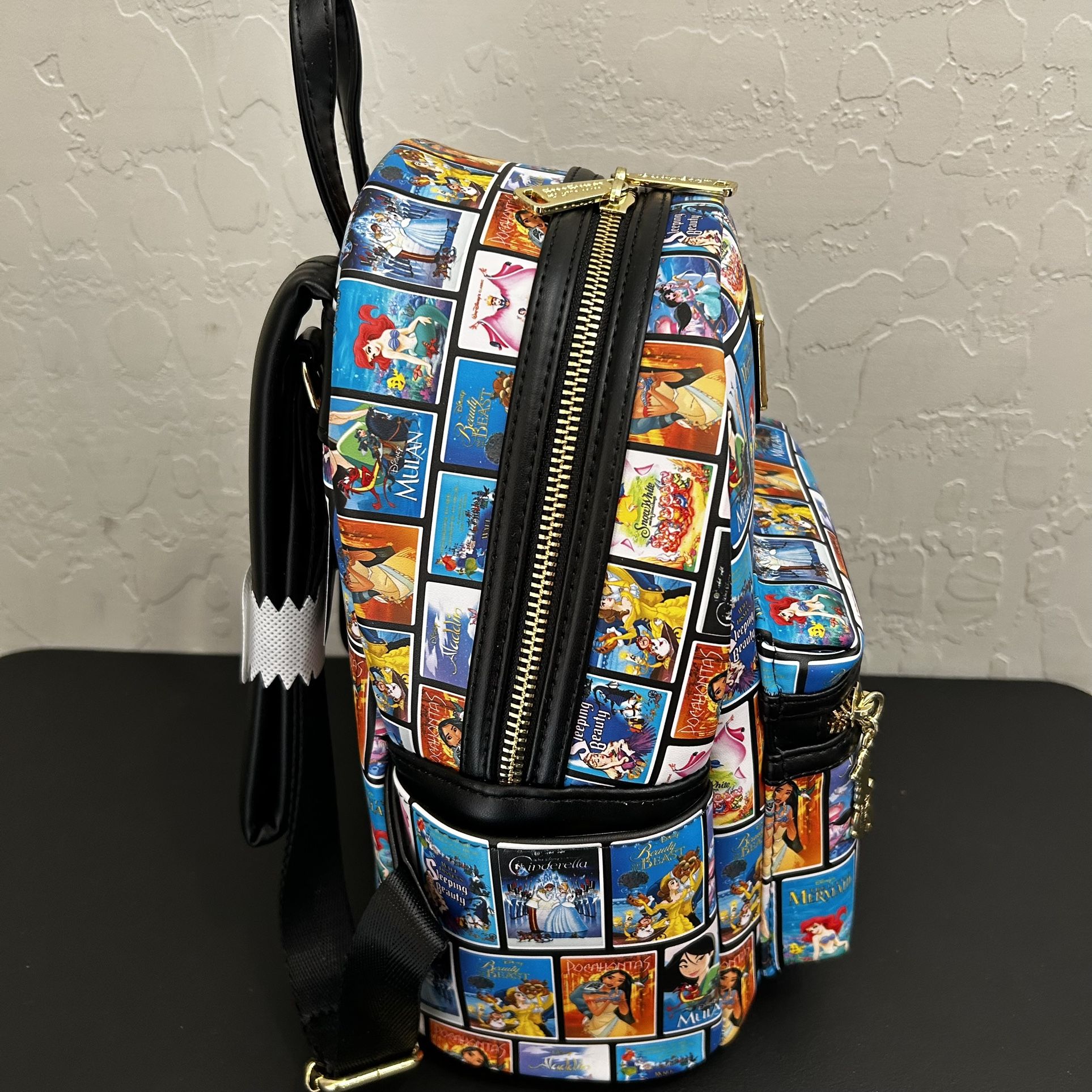 disney princess vhs tapes loungefly mini backpack NEW Loungefly Disney Princess VHS Tapes All Over Print Mini Backpack &  Briefcases