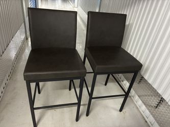2 Black leather bar/counter Stools